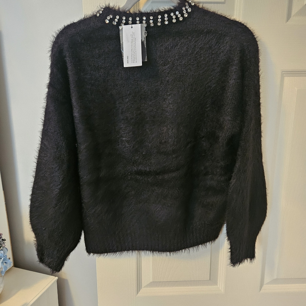 Elegant Black Sweater with Embellished Neckline